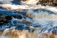 Close-up of rapids above a waterfall