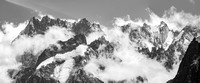 Clouds are the only things to make mountains look small.. Mont Blanc massif.